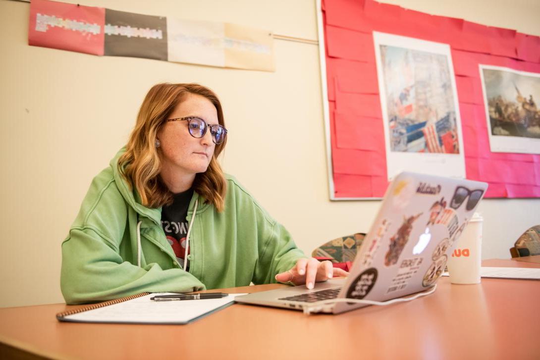 Student in classroom on computer